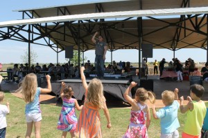 Eddie Coker entertaining children.